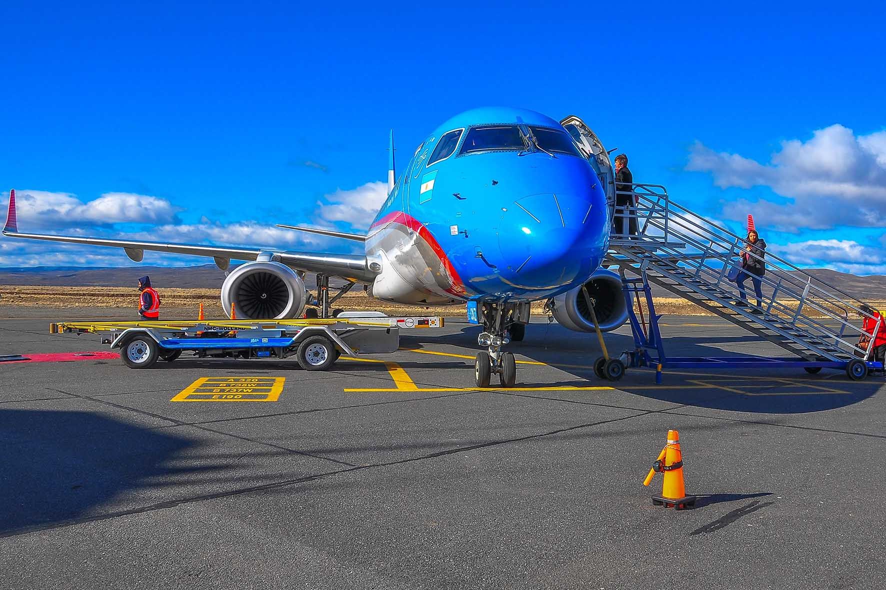 Passenger boarding bridges and passenger stairs